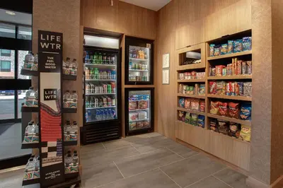 a convenience store aisle with food and drinks iniger at Fairfield by Marriott Inn & Suites Denver Southwest, Littleton in Littleton