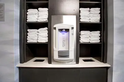a shelf filled with towels and a appliance at Fairfield by Marriott Inn & Suites Denver Southwest, Littleton in Littleton