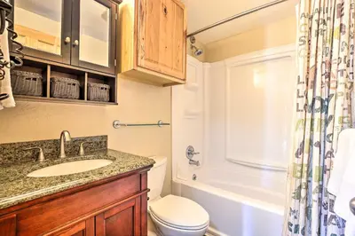 a bathroom with a sink and a toilet and a tub at Keystone Mountain Getaway Walk to Ski Lifts in Keystone