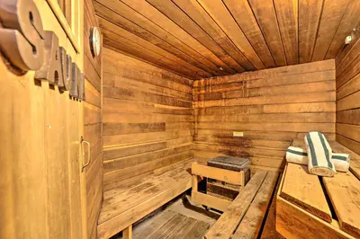 a wooden sauna with a bench and a machine at Keystone Mountain Getaway Walk to Ski Lifts in Keystone