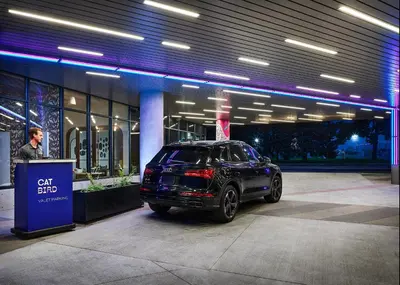 a car parked in front of a building at Catbird Hotel in Denver