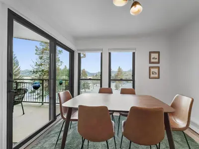 a dining room with a table and chairs at A304 Lake Cliffe condo in Dillon