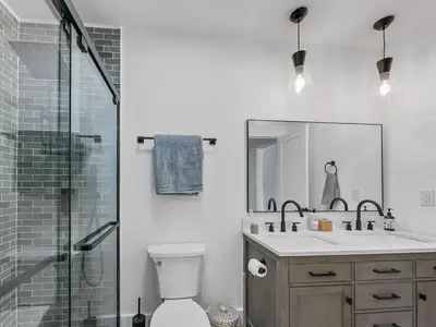 a bathroom with a shower and a toilet and a sink at A304 Lake Cliffe condo in Dillon