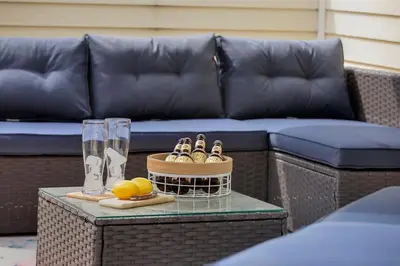 a table with shoes and a basket on top of a couch at Hip Old Town North Gem! Near Breweries and River! in Fort Collins