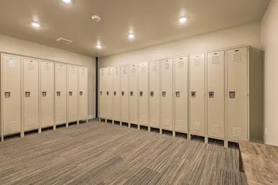 a row of white lockers in a locker room at Walk to Lifts Condo with Mtn Views in Keystone! in Keystone