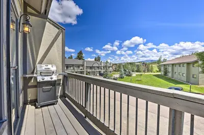 a balcony with a view of a yard at 3-Story Home with Balcony about 6 Mi to Winter Park! in Fraser
