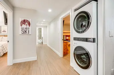 a laundry room with a washer and dryer at Luxury Keystone Cabin with Hot Tub, 1 Mi to Lifts! in Keystone