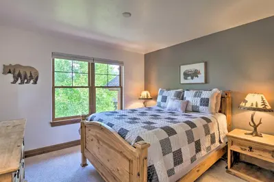 a bedroom with a bed and a window at Private Hot Tub Family Townhome in Breckenridge in Breckenridge