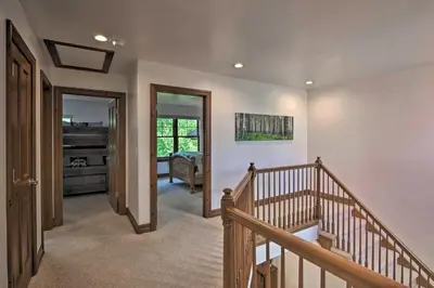 a staircase in a home with a stairway leading to a room at Private Hot Tub Family Townhome in Breckenridge in Breckenridge