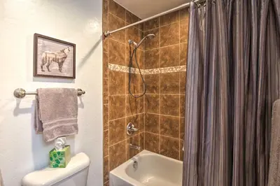 a bathroom with a shower and a toilet at Private Hot Tub Family Townhome in Breckenridge in Breckenridge