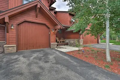 a garage of a house with a driveway at Private Hot Tub Family Townhome in Breckenridge in Breckenridge