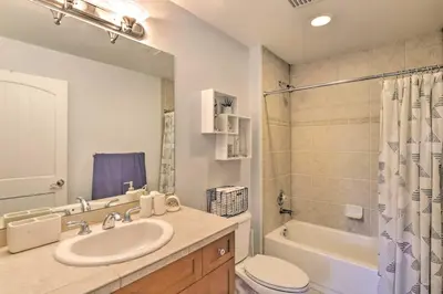 a bathroom with a sink and a toilet and a shower at 5 Mi to Ski Resort Breck Penthouse Studio in Breckenridge