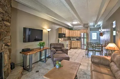 a living room with a couch and chairs and a kitchen at Frisco Condo 2 Blocks to Main St Year-Round Fun! in Frisco