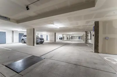 an empty parking garage with a car parked in it at Clearwater Lofts 107 Building 3 in Keystone