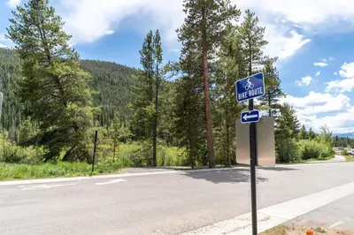a blue street sign on the side of a road at Clearwater Lofts 107 Building 3 in Keystone
