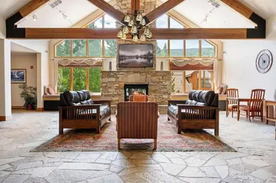 a living room with couches and a fireplace at Gateway Mountain Lodge 5029 - Keystone in Keystone