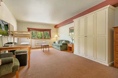 a living room with a couch and a bed at Gateway Mountain Lodge 5029 - Keystone in Keystone