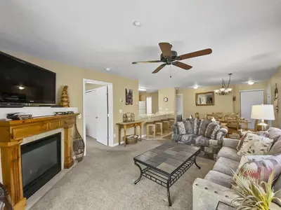 a living room with a couch and a fireplace at Swans Nest Villa 1304 condo in Breckenridge