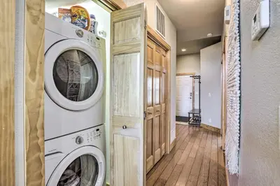 a laundry room with a washer and dryer at 7 Mi to Slopes Main Street Condo in Dillon in Dillon