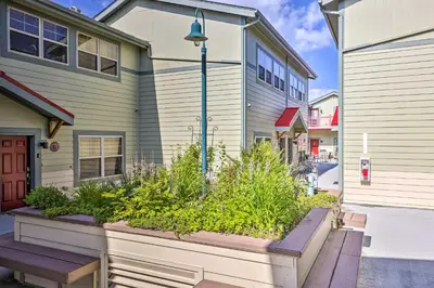 a house with a bench in front of it at 7 Mi to Slopes Main Street Condo in Dillon in Dillon