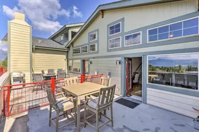 a house with a deck with a table and chairs at 7 Mi to Slopes Main Street Condo in Dillon in Dillon