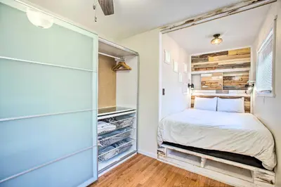 a bedroom with a bed and a closet at Modern House with Yard Less Than 7 Mi to Downtown Denver! in Denver