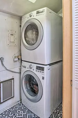 a washer and dryer in a laundry room at Modern House with Yard Less Than 7 Mi to Downtown Denver! in Denver