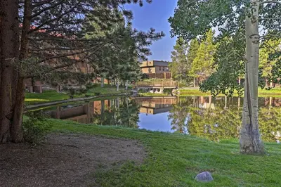 a view of a river with a building in the background at Less Than 2 Mi to Frisco Adventure Park Cozy Townhome! in Frisco