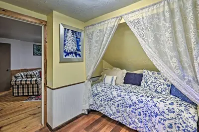 a bedroom with a bed with a canopy at Chicago Creek B and B 1 Mi to Mt Blue Sky! in Idaho Springs