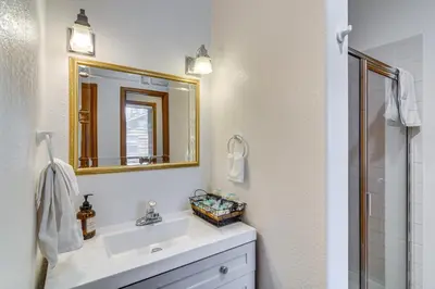 a bathroom with a sink and a mirror at Chicago Creek B and B 1 Mi to Mt Blue Sky! in Idaho Springs