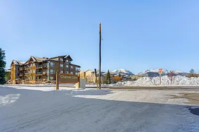 an empty street in front of a building with snow at 7 Mi to Ski Resort Dillon Condo with Mtn Views in Dillon