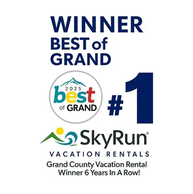 a logo for the winner best of best of grand at Cozens Pointe B-301 condo in Fraser