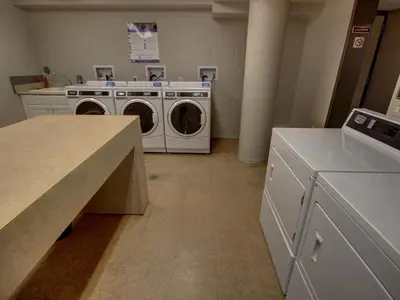 a laundry room with a washer and dryer at 2534 Saints Johns condo in Keystone