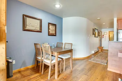 a dining room with a table and chairs at 8 Mi to Keystone Resort Dillion Condo with Hot Tub! in Dillon