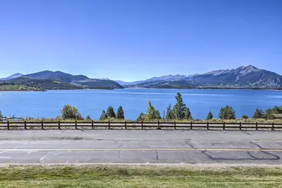 a view of a lake with mountains in the background at 8 Mi to Keystone Resort Dillion Condo with Hot Tub! in Dillon