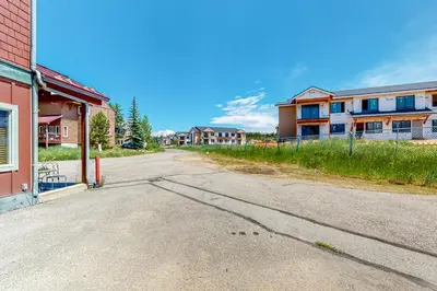 an empty street in a town with buildings at WinterStar E-2 in Fraser