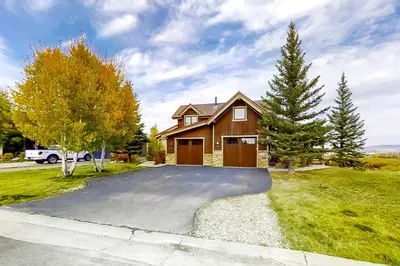 a house with a driveway in front of it at Mountain Sky in Granby