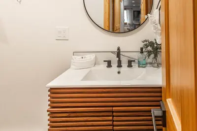 a bathroom with a sink and a mirror at Mountain Calling in Grand Lake