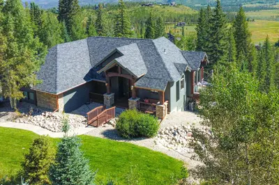 an aerial view of a house with a roof at Hilltop Palace in Fraser