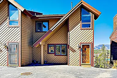 a large house with a garage at Wapiti Townhouse 3 in Fraser