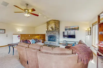 a living room with a couch and a fireplace at The Cove Retreat in Dillon