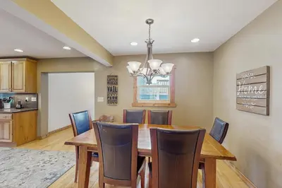 a dining room with a wooden table and chairs at The Cove Retreat in Dillon