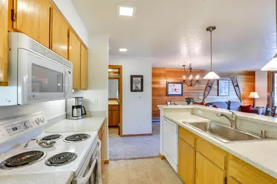 a kitchen with a stove and a sink at 1 Mi to Keystone Ski Lift Lakefront 4-Season Gem in Dillon