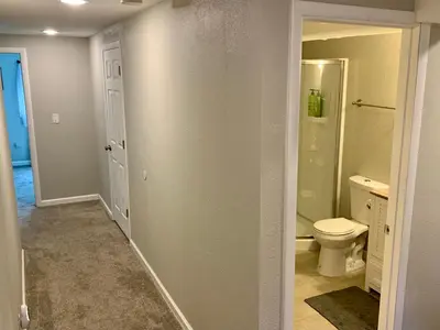 an empty bathroom with a toilet and a sink at Your home close to Anshutz and DIA in Aurora