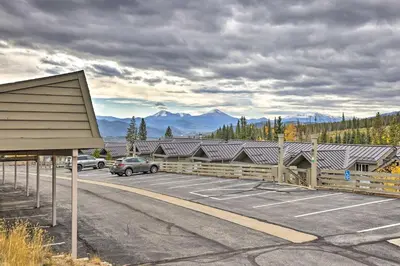 a parking lot with cars parked in front of a building at Silverthorne Gem with Community Perks 11 Mi to Ski! in Silverthorne