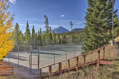 a tennis court in the middle of a field at Pool, Hot Tub and Ski Shuttle! Silverthorne Condo in Silverthorne