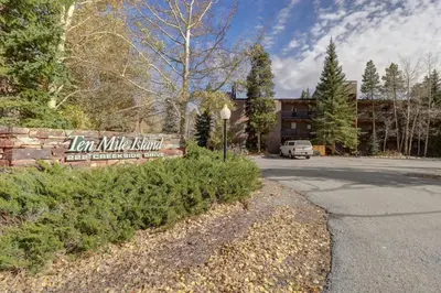 a sign in front of a building with a parking lot at B207 Ten Mile Island 2Br 2Ba condo in Frisco