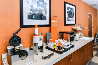 a counter in a room with a coffee shop at Hampton Inn & Suites Boulder North in Boulder