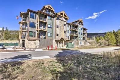a large apartment building on the side of a road at 1 Mi to Ski Slopes! Mtn-View Condo in Keystone in Keystone