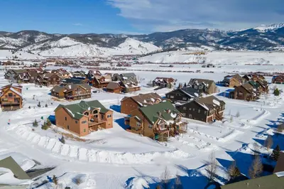 an aerial view of a town covered in snow at 67 Fireweed 27A by Stay Winter Park in Tabernash
